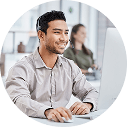 male-call-center-rep-looking-at-monitor